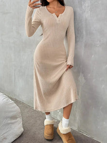 Ribbed long sleeve knit dress in beige with button detail, perfect for casual or stylish occasions.