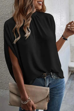 Tie Back Slit Half Sleeve Blouse showcased in black, featuring a stylish design with a chic silhouette.