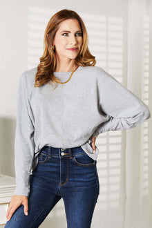 Double Take Seam Detail Round Neck Long Sleeve Top in gray, featuring a relaxed fit and elegant seam detail.