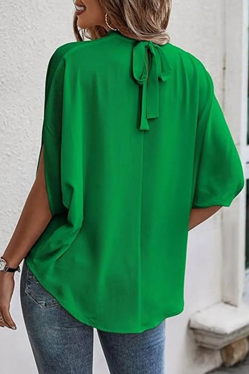 Tie Back Slit Half Sleeve Blouse in vibrant green with a tied back detail, showcasing a stylish and comfortable design.