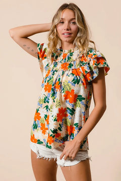 BiBi Multi Color Floral Print Woven Top featuring vibrant floral design and ruffled sleeves, perfect for summer outfits.