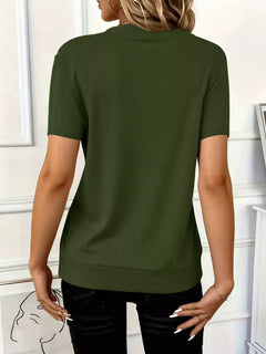 Half Zip Short Sleeve Top in olive green, showcasing the ribbed texture and slightly stretchy fit from the back.