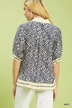 Umgee Geometric Leaf Print Popover Top featuring a stylish back view design in navy leaf print