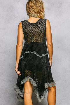 Woman wearing POL Texture Lace Ruffled Sleeveless Dress with unique lace ruffles and flowy handkerchief silhouette.