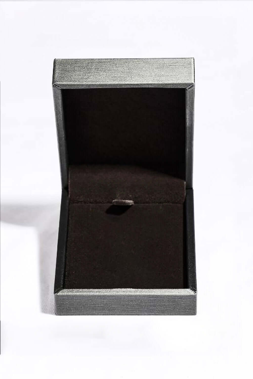 Elegant open jewelry box for showcasing a necklace, ideal for gifting moissanite or other fine jewelry.