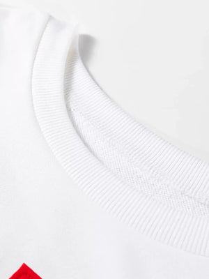 Close-up of the neckline on the Plaid MERRY Christmas Vacation Sweatshirt, showcasing the soft texture.