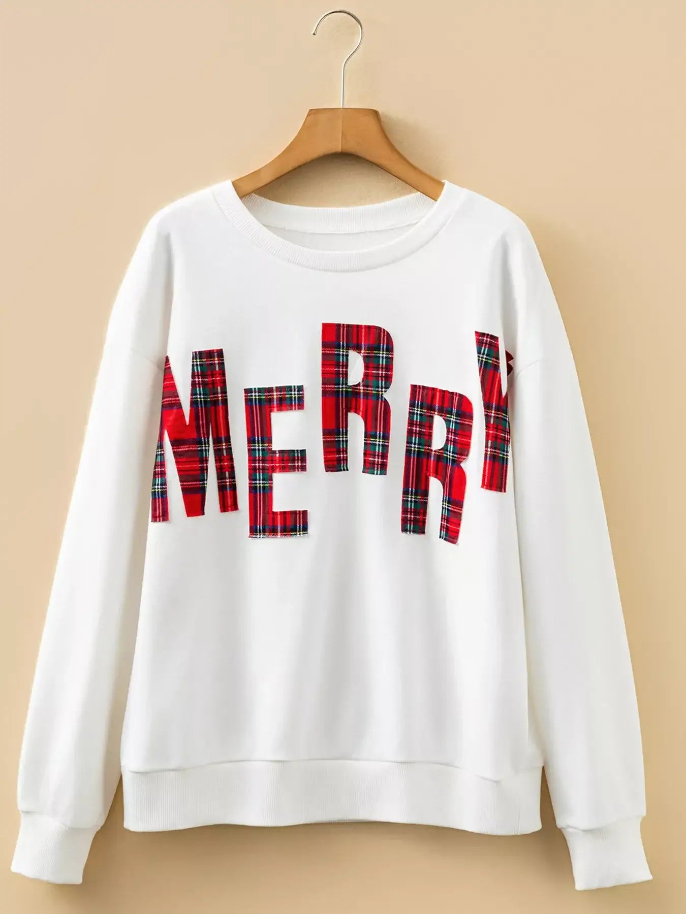 Plaid MERRY Christmas Vacation Sweatshirt displayed on a hanger against a neutral background.