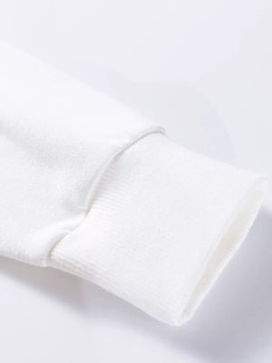 Close-up of the sleeve cuff of the Plaid MERRY Christmas Vacation Sweatshirt, showcasing its soft fabric.