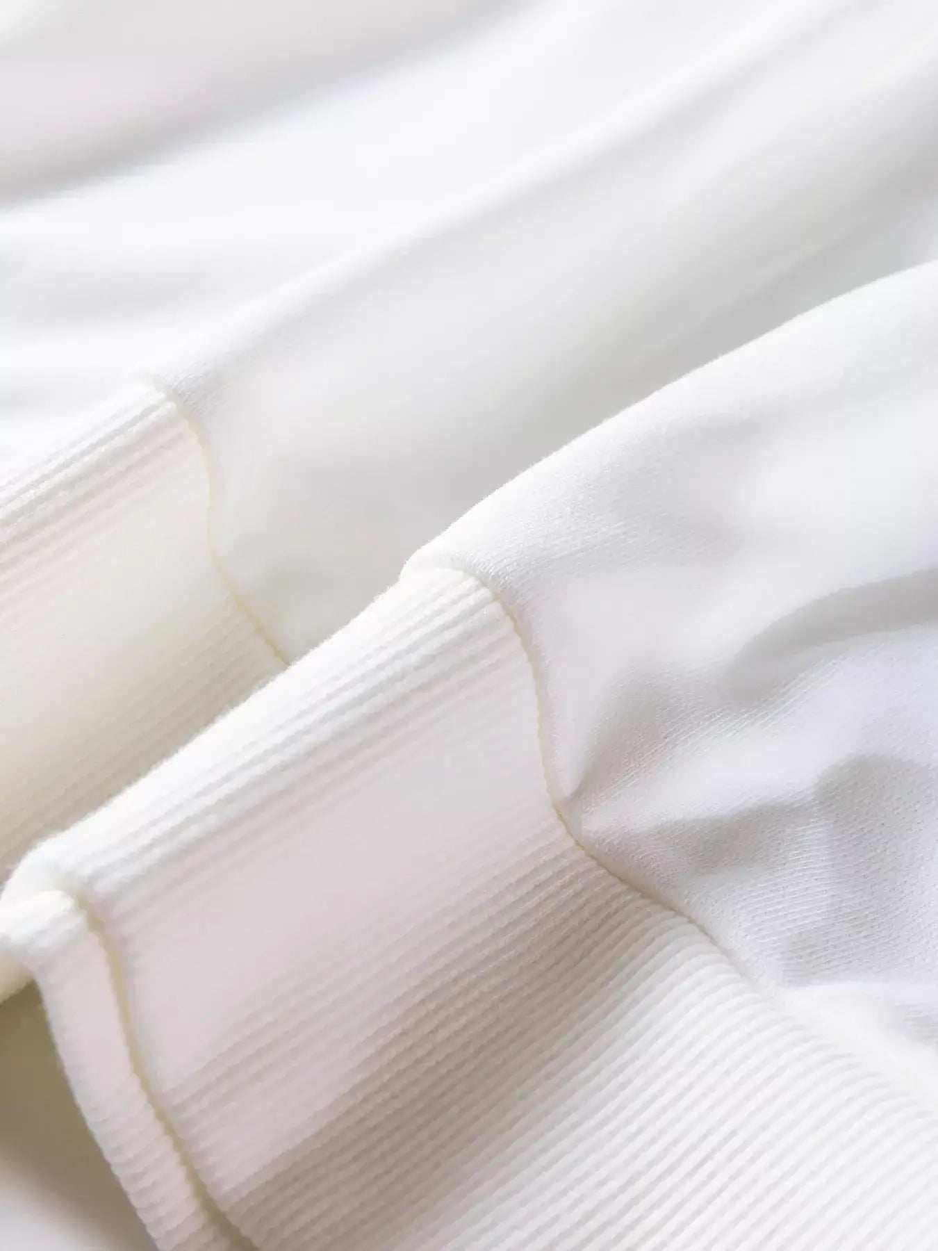 Close-up of the soft fabric texture of the Plaid MERRY Christmas Vacation Sweatshirt.