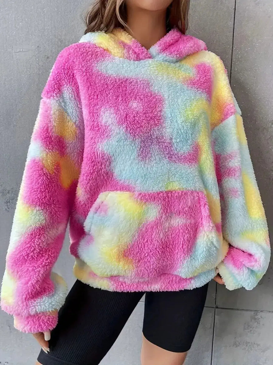 Tie-Dye Plush Fleece Hoodie in vibrant pink, yellow, and blue colors with a pocket and cozy oversized fit.
