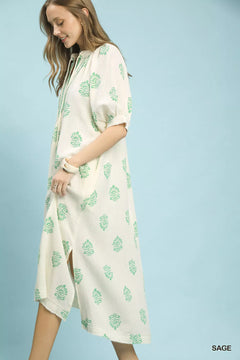 Umgee Printed Cotton Gauze Midi Dress featuring split neckline, tassel ties, and side hem slits.