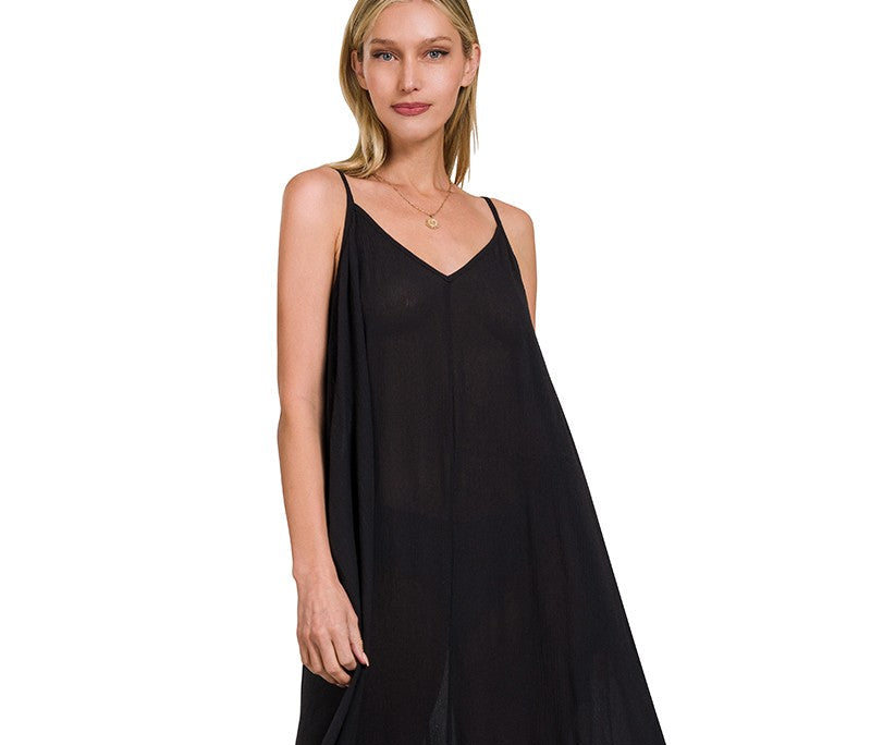 Crinkle Cami Maxi Dress in black, featuring a flowy silhouette and side pockets, ideal for warm weather.
