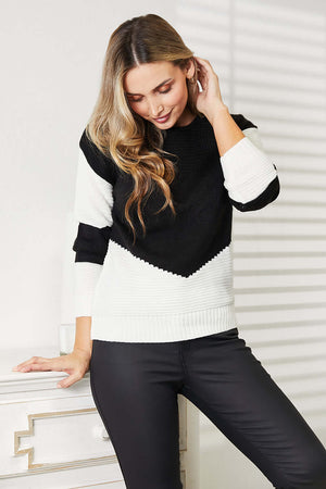 Woven Right Two-Tone Openwork Rib-Knit Sweater styled for a chic look, featuring a black and white color scheme.