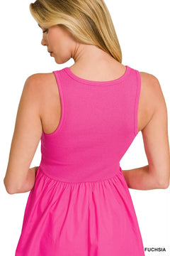 Back view of a woman wearing the Zenana Combined Knit & Woven Midi Dress in vibrant fuchsia.
