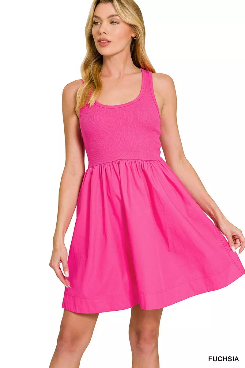 Model wearing the Zenana Combined Knit & Woven Midi Dress in vibrant fuchsia, showcasing its stylish fit and design.
