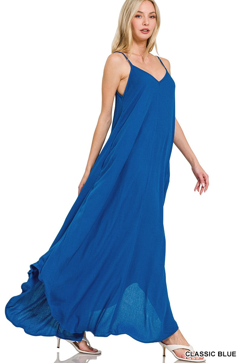 Zenana Woven Crinkle Cami Maxi Dress with Side Pockets in classic blue, featuring a flowy silhouette and stylish side pockets.