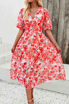 Smocked printed V-neck short sleeve dress with floral design, perfect for summer outings.
