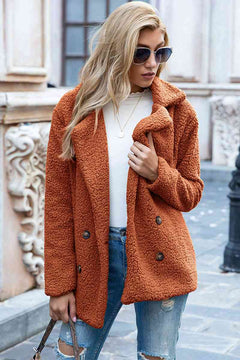 Full size lapel collar sherpa coat in orange, styled casually with sunglasses and jeans, perfect for urban fashion.