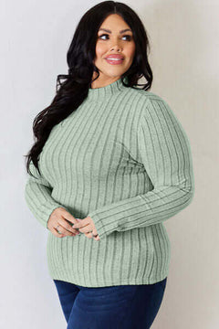 Plus size ribbed mock neck long sleeve t-shirt in soft green color, perfect for casual wear.