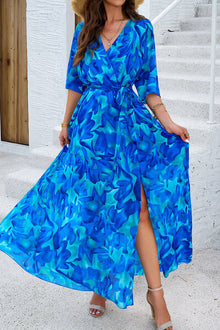 Printed tied half sleeve dress in vibrant blue with slit, perfect for summer outings or beachwear.