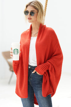 Model wearing a red Dolman Sleeve Open Front Longline Cardigan with sunglasses and holding a Starbucks cup.