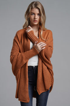 Model wearing Double Take Dolman Sleeve Open Front Ribbed Trim Longline Cardigan in rust, showcasing casual and chic style.