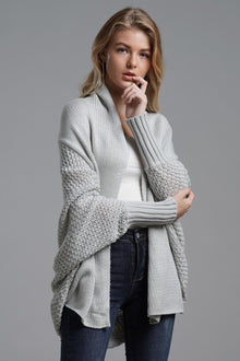 Model showcasing a Double Take Dolman Sleeve Open Front Ribbed Trim Longline Cardigan in soft grey.