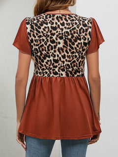 Back view of Leopard Round Neck Flutter Sleeve Babydoll Blouse featuring a chic leopard pattern and flutter sleeves.