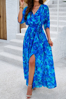 Elegant blue floral printed tied half sleeve slit dress perfect for summer outings.